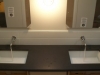 mstr_twin_lavatory_w__kohler_undercounter_lavatory__jodo_wall_faucet